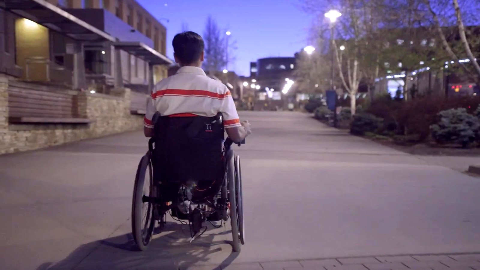 Rear view of the Friction Robotics prototype driving down an outdoor path